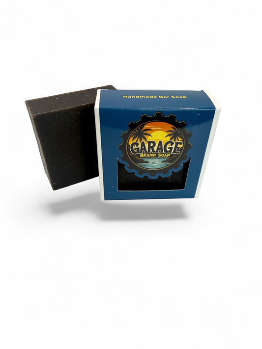 Garage Brand Soap exfoliating coffee bar soap with visible coffee grounds in a branded blue and white box