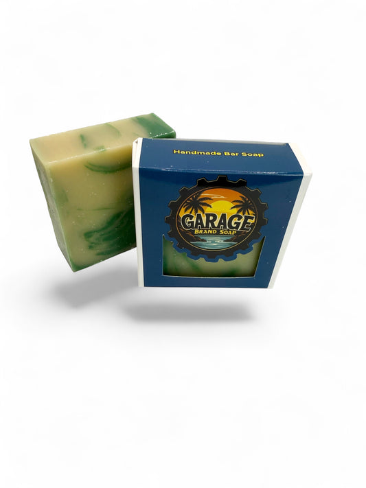 Garage Brand Soap Florida Pine handmade bar soap with green and cream swirls in branded blue packaging