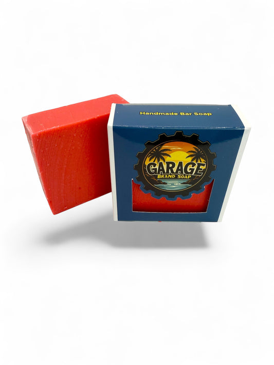 Garage Brand Soap Papaya Passion handmade bar soap in bright red with blue branded packaging on a white background.