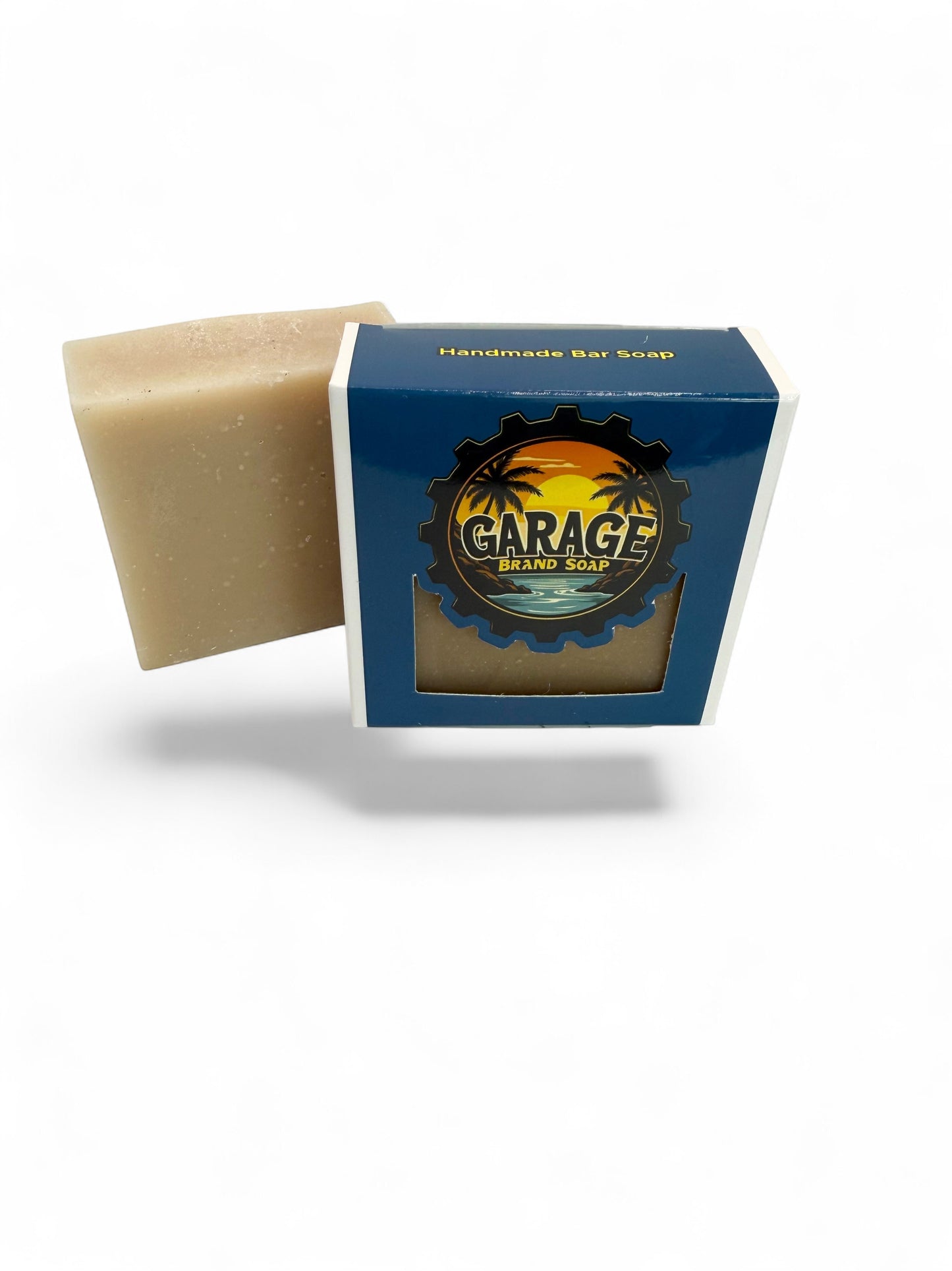 Garage Brand Soap Santal and Coconut handmade bar soap with a natural beige tone and branded blue packaging.